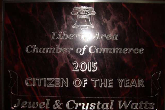 A plaque that reads citizen of the year.